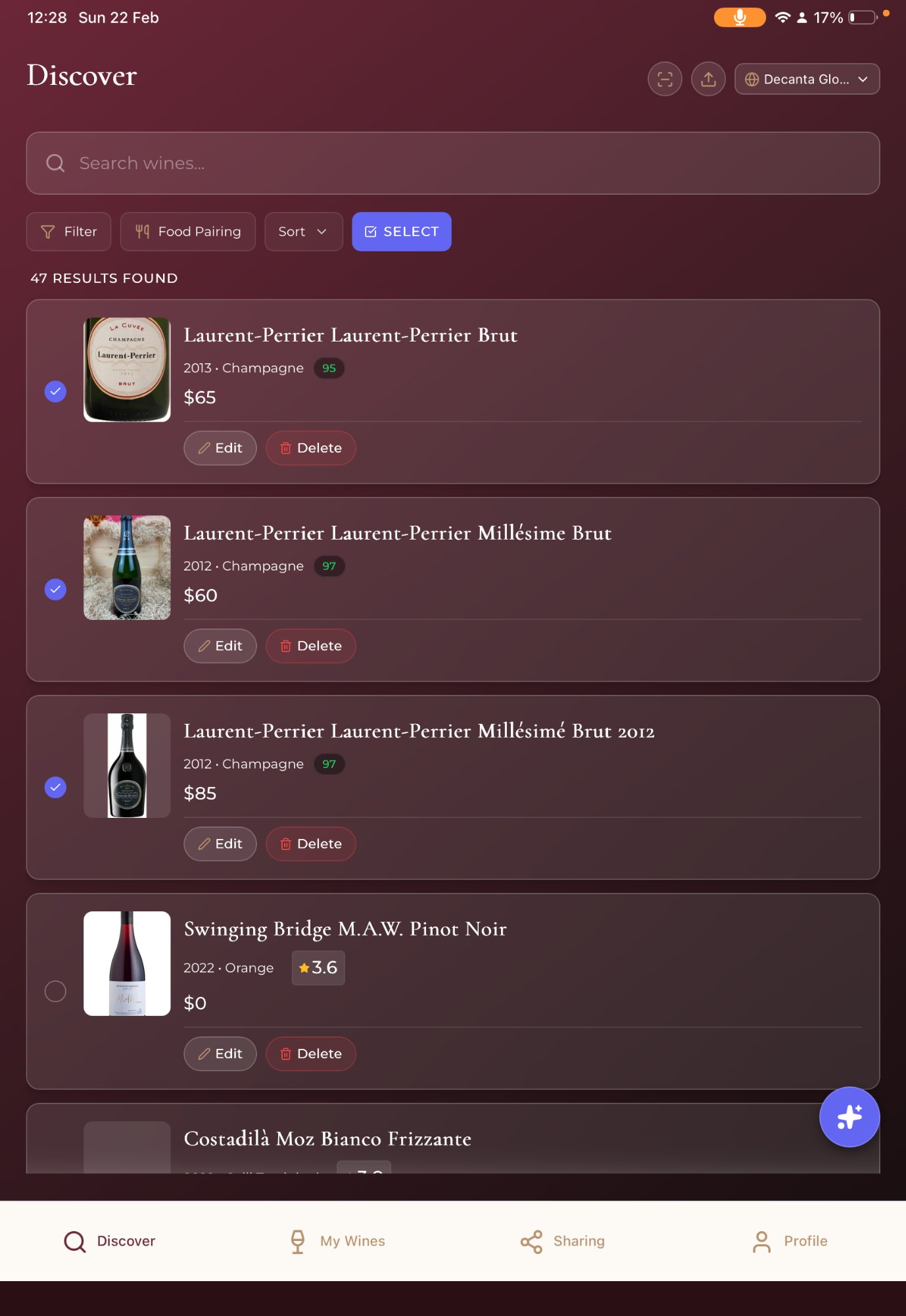 Decanta.ai wine discovery mobile app showing cellar with Laurent-Perrier Champagne collection, vintage ratings and food pairing filters